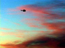 Arctic sunrise silhouettes the Louis’s helicopter