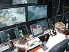 Pilot Todd Gregory demonstrating the manipulator arm controller of Hercules.