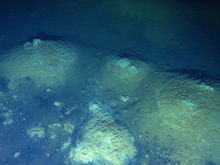 Low temperature hydrothermal mounds in the northern part of the Santorini caldera