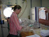 Scientist culturing microbes in the lab aboard the R/V Melville.