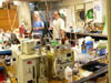 Chemists work long hours in the lab after a water sampling dive.