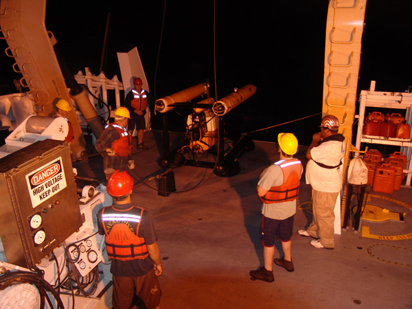 Preparing to launch the Laser Line Scanner tow vehicle at night