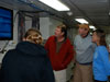 Dr. Cheryl Morrison and other members of the science party watch the seafloor imagery.