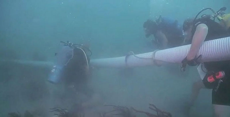 Watch as divers sample bedrock chert, survey the site, and collect their tools before heading back to shore for an early conclusion to the expedition.