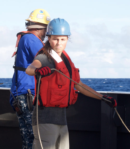 Molly prepares the AUV Sentry for deployment.