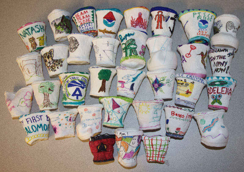 Cups from the Junior Volunteers at the North Carolina Museum of Natural Sciences and some of the science team after a dive.