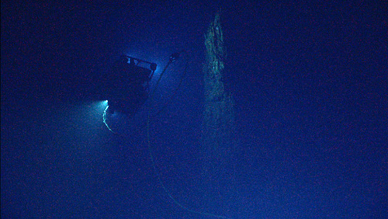 Silhouette of Little Hercules as it approaches extinct hydrothermal sulfide spire along the Galápagos Rift.