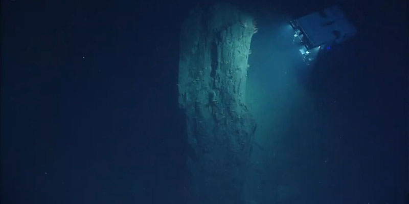 ROV D2 inspecting a large block of mudstone displaced from the wall of Heezen Canyon.