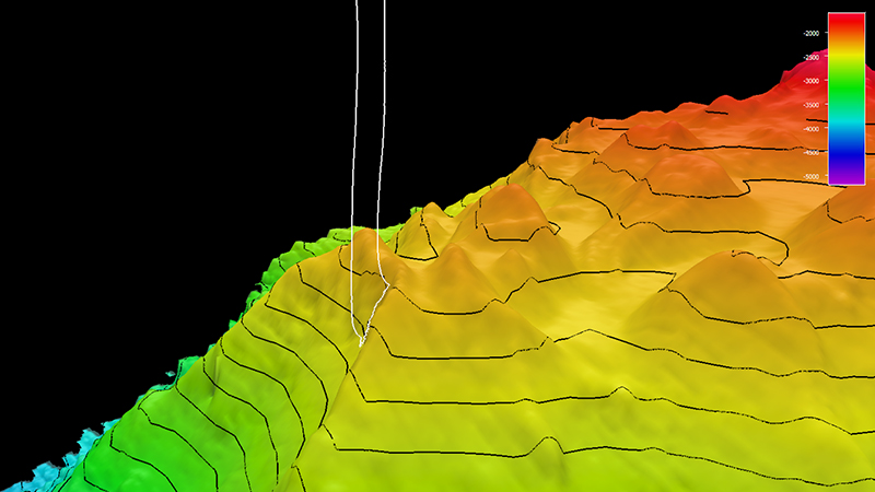 3D topographic map with color gradients from green to red, showing elevation changes with contour lines.